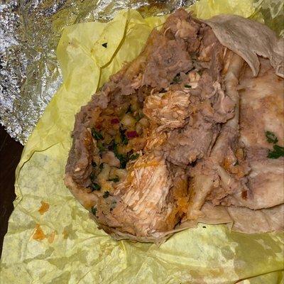 This is the "shredded" chicken burrito  Couldn't even bite through it in the burrito it's just hunks or breast meat. Super foul