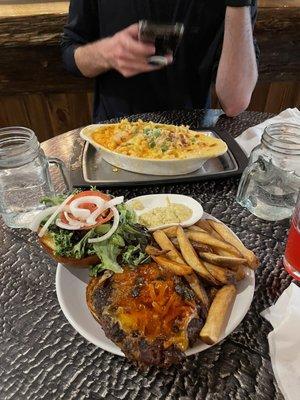 Bison burger with huckleberry-jalapeño BBQ sauce and lobster Mac and cheese.