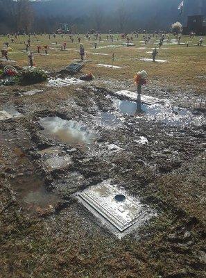 This is from the employee's running over the graves and causing damage.