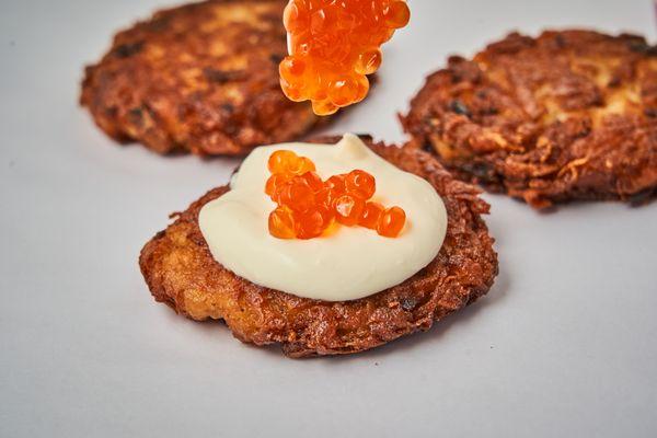 Latkes top with cream  fresh and Salmon Roe