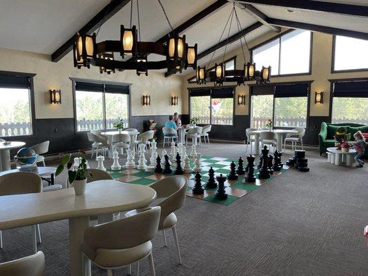 Inside seating area, games for children.