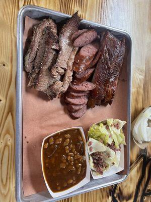 Ribs, Sausage, brisket, cabbage, and bbq beans