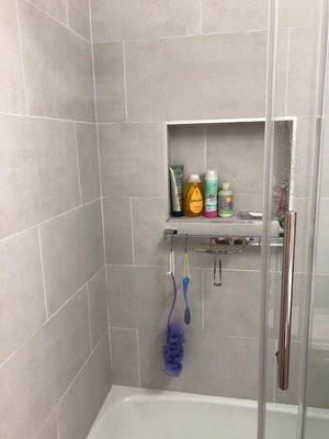 Shower wall with recess