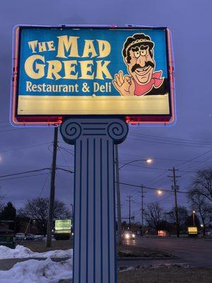 The Mad Greek sign