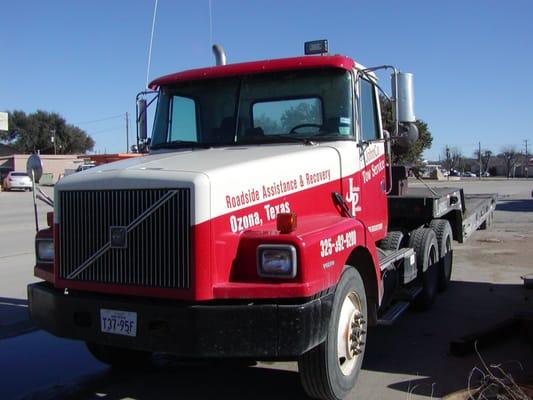 Extra long tractor trailer with tilt bed for difficult hauling