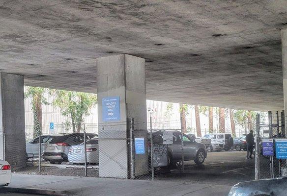 Employee parking lot under the I-580 freeway,  enter on Broadway