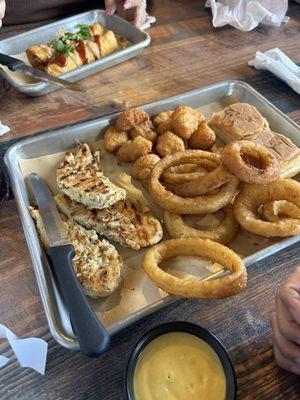 Greek marinated Chicken Tenders Plate Onion Rings Hushpuppies