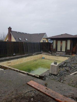 Complete pool remodel project.  Just beginning the demolition of deck, tile, and coping.