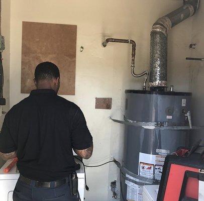 Servicing a 100 gallon water heater