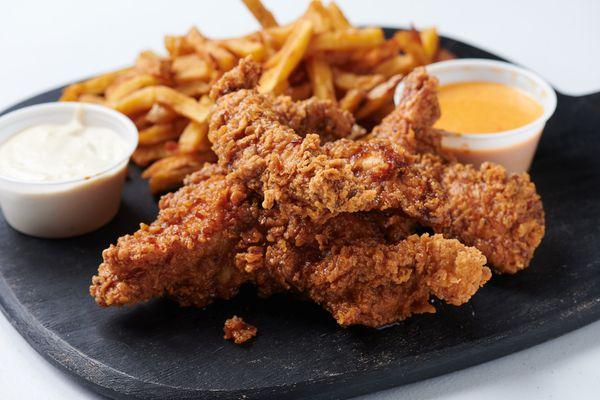 crispy chicken tenders and house cut fries.