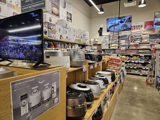 Home goods with a lot of rice cookers