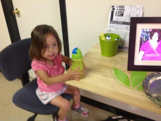 Ruby is enjoying her protein bar and Shake at SOS Nutrition Club!