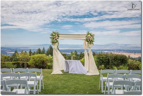 chuppah and flowers by laurie