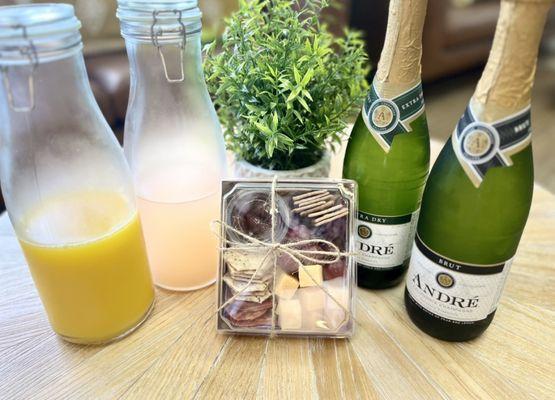 Now offering a mimosa bar and charcuterie boxes. Try our Signature:  strawberry lemonade mimosa, garnished with fresh organic strawberries.