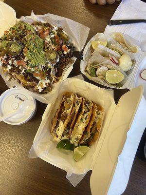 Nachos with steak, Birria taco, chicken taco