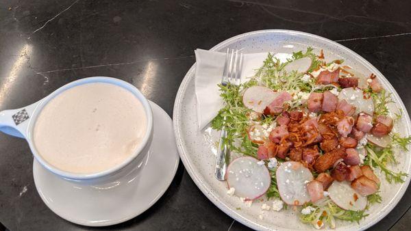 Chai tea latte and frisee aux lardons salad