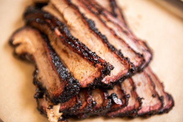 Smoked brisket with bark and smoke ring