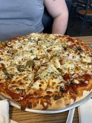 Pineapple, jalapeños, pepperoni, and mushrooms