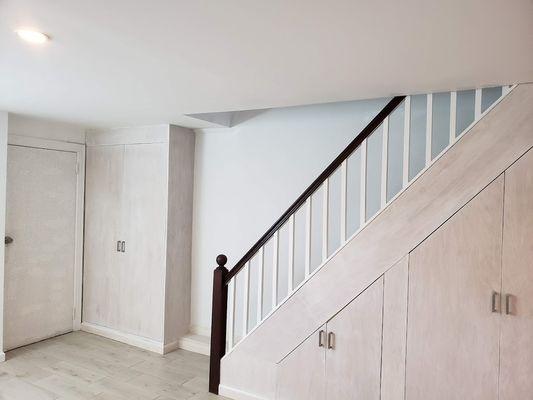 Custom built pantry under staircase