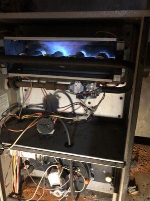 Gas furnace cracked on heat exchanger shoots flames back out of the furnace, it's dangerous.