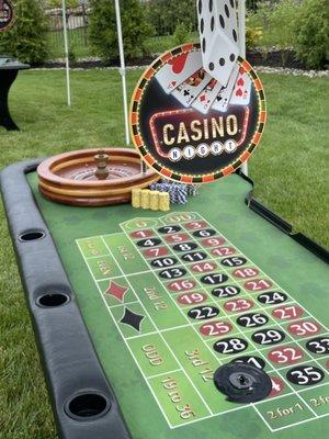 Lovely outdoor set-up roulette table and blackjack table! Professional dealers!