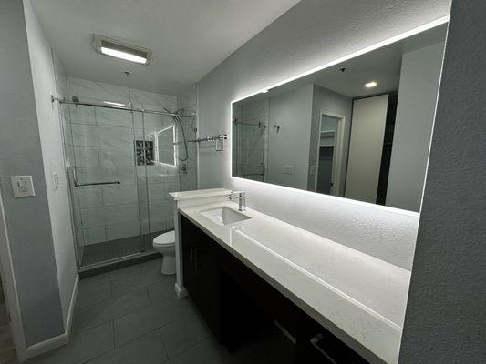 Master Bedroom bathroom.  The mirror looks like it was just out of the box.