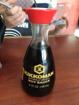 Kikkoman soy sauce. Better than the cheap crap that most places leave out lol