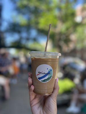 Iced Caffe Latte (~$6) with oat milk (+$1)