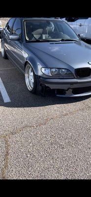 Broken bumper and peeling clearing coat on the hood