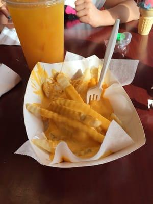 Cheeses fries and passion fruit water