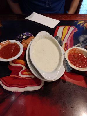 Large cheese dip with jalapeños and both salsas.