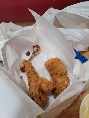 breaded chicken strips nothing to write home about whatsoever also a very dried out leg