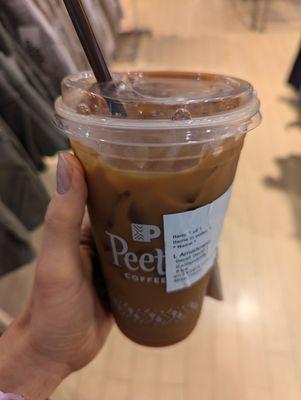 Decaf iced Americano w/ cinnamon and almond milk.