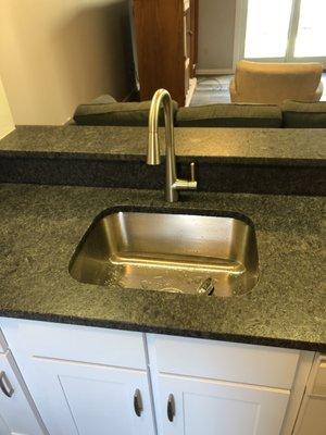 Moen in brushed on leather granite top from Countertop Stop in Yarmouth.