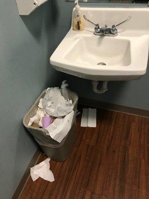 Overflowing trash at Coast Dental