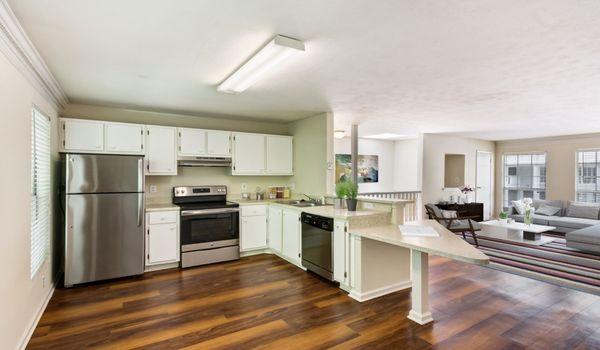 Designer cabinets, white quartz countertops and stainless steel finishes!