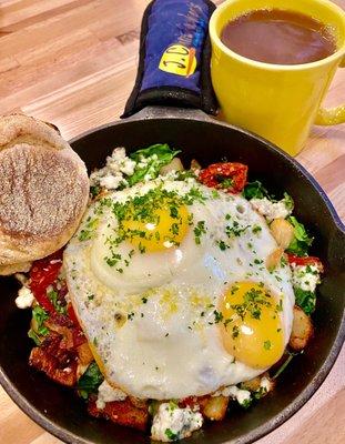 Potato's, bacon, feta, spinach, sun dried tomatoes and a couple eggs.  I'm set for the day!  Lol