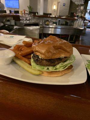 Black and Bleu burger with sweet potato fries.