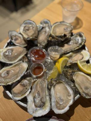 Dozen raw oysters