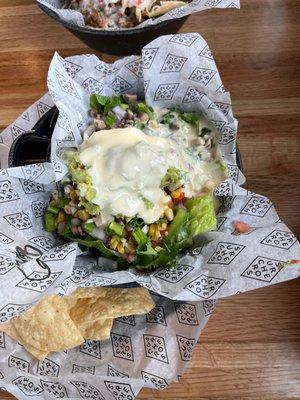 Big burrito bowl with beef.