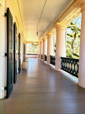 The second floor of the home on the wrap around porch...first time being on one