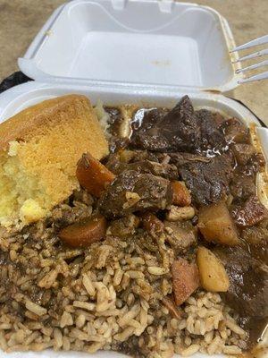 Brown stew beef with rice and beans