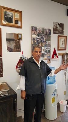 Frank in front of his memorabilia.