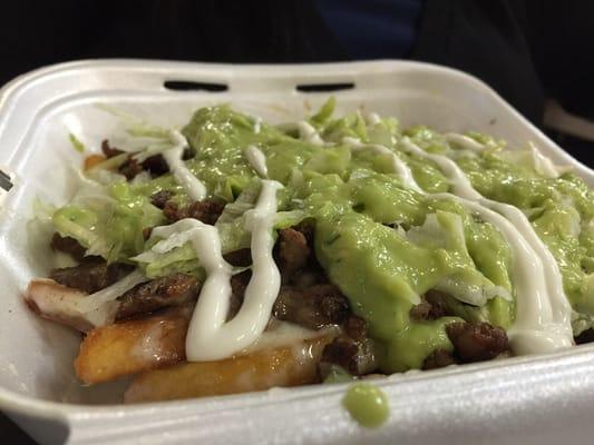 Asada Fries with Carne Asada. They Use steak fries, which is the best to use.