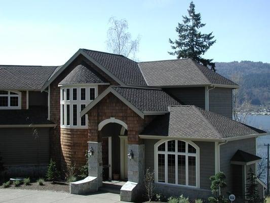 Designer composition shingles can pacify a HOA committee while still elevating your curb appeal. Let's talk!