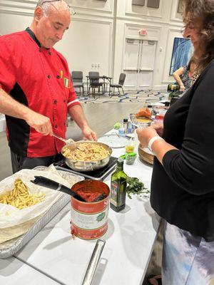 Chef Baba preparing a pasta dish