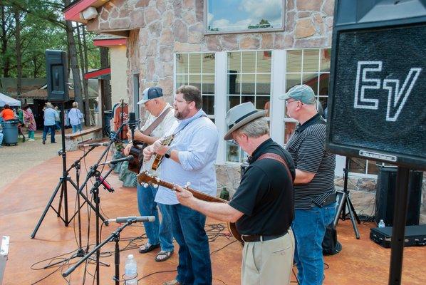 Band plays in front of the General Store.