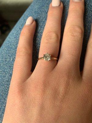 Corinne was able to take my grandmothers diamond and put it in this beautiful, simple 14k gold band. it's perfect!