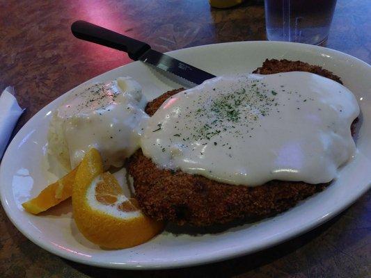 Chicken fried steak w/ side of mashed potato and white gravy