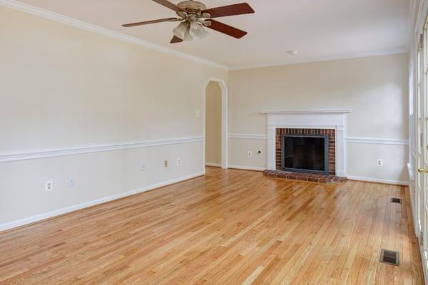 This is the wonderfully spacious living room of 1635 Stowe Rd. before we placed any furniture...